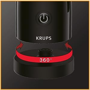 Espumador de leche negro de Krups con base giratoria roja y botón de encendido en la parte superior